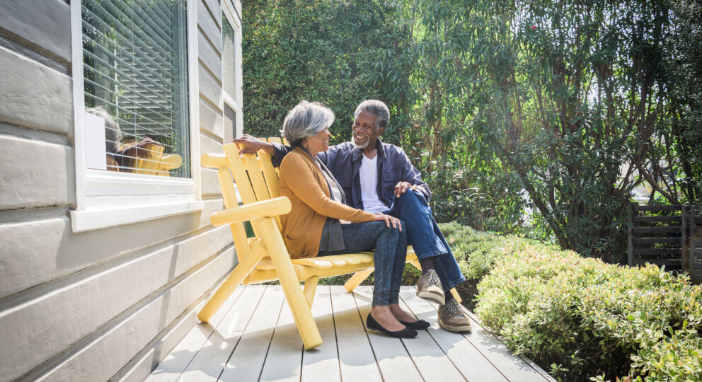 Couple talking on the porch