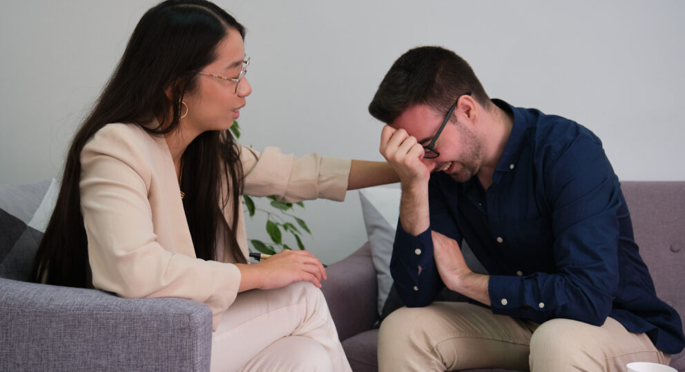 Woman helping partner feel better