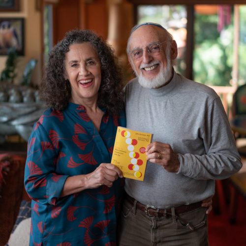 photo of John & Julie Gottman with Love Prescription book